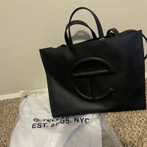 Telford large black shopper. Never used only took out of dust bag for pictures.